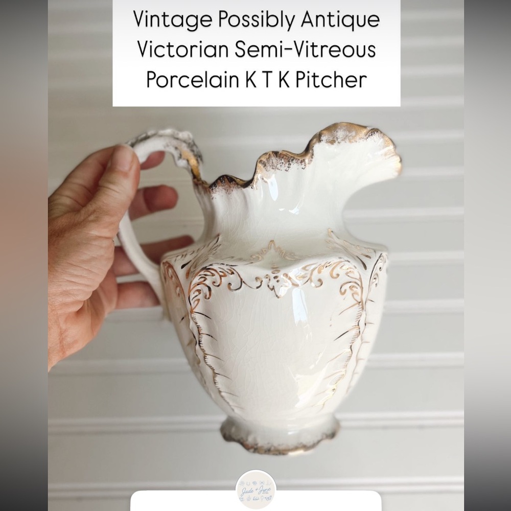 Elegant White and Gold Pitcher